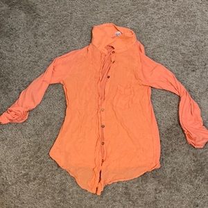Peachy color Poof! Shirt Small